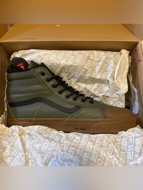 Vans Olive High-Top Sneaker with Black Stripe and Gum Sole